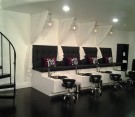 view of indulgence day spa manicure chairs